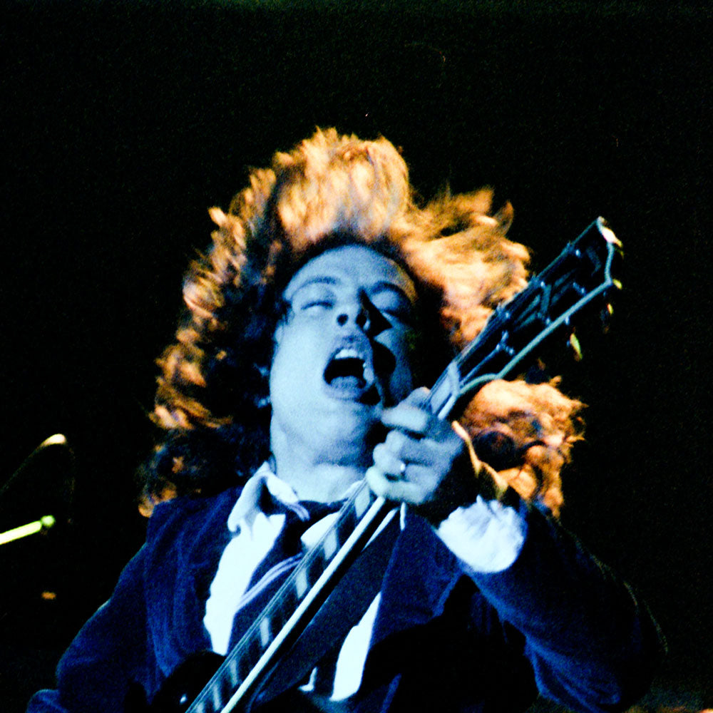 Angus Young (AC/DC, Paris 1982) Photograph by Alex Mitram. - French ...